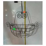 Metal wire plant hanger, most of the white paint