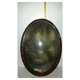 Early photo of gentleman, framed with concave