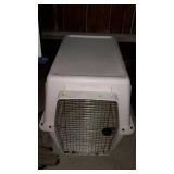 Large dog crate, measures 44 inches long, by 37