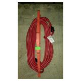 Orange extension cord with winding bar