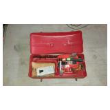 Homelite chainsaw with carry/storage case. Model