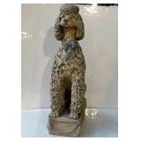 Poodle plaster lawn statue has a hole in back