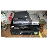 Group of DVD players and vhs tape player