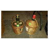 Two wicker wrapped wine bottles