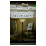 Torchiere floor lamp with ivory plastic shade,