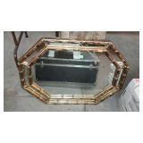 Wall hanging mirror, measures 34 inches long, by