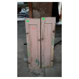 Two narrow cabinet doors, chippy paint with glass