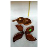 Monkey wood ware-five leaf shaped dishes, one is