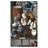 Grouping of owl figurines, trivets, planter, etc