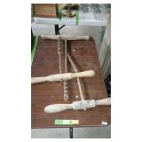 Three early auger bore tools one has a bend