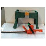 Electric set of 18" hedge clippers, and a tool