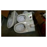 Group of three Sloan toilets no backs