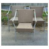 Three outdoor lawn or patio chairs, faux wicker