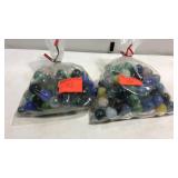 Two bags of marbles