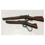 Two toy guns, possibly single shot cap guns lever