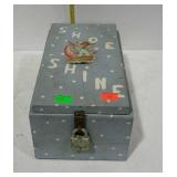 Shoe shine box filled with older advertisement