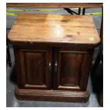 Pine double door cabinet with interior drawer -