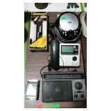 Group lot: radios, phone and flashlight.