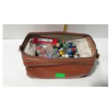 Vintage hygiene kit full of marbles. Some old and