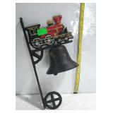 Cast iron dinner bell with train decor. For