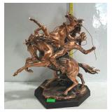 Copper horses and cowboy statue. Reminiscent of