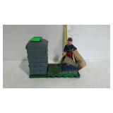 Cast iron artillery bank. Has a few coins inside.