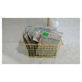 Wire basket full of prisms, many in original