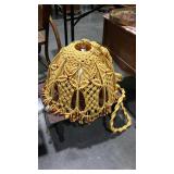 Macrame hanging light fixture and wooden