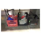 Three milk crates with a couple hand towels