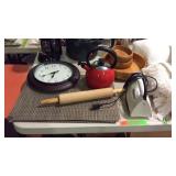 Group lot with teapots, placemats, iron, coffee