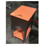 Painted metal stand in casters with storage