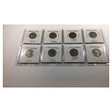 Eight Buffalo nickels