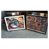 Two framed wall decor prints, one entitled
