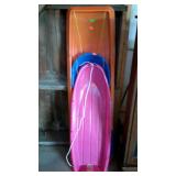 Group of three plastic sleds