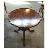 Small pie shaped stand, measures 22 inches in