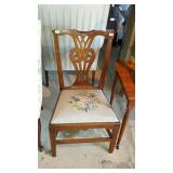 Accent chair with floral design seating and