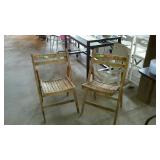 Two early all wooden folding chairs both matched