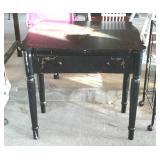 Flip top game table with drawer and floral design