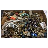 Flat of costume jewelry