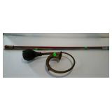 Brass horn and carnival sticks. Horns rubber is