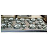 43 pieces of green and white dishes, no makers