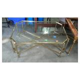 Glass top coffee table, measures 40 inches long,