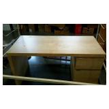 Blonde two drawer desk, measures 55 inches