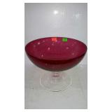 Cranberry glass pedestal bowl with clear glass