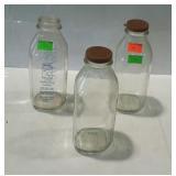 Three milk bottles, quart sizes, 2 no marks one