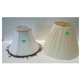 Two lamp shades, both fabric pleated and one bell