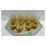 Twelve amber drink glasses. 1970s style.