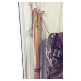 Bundle of measuring sticks have nails in them