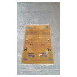 Brown native American style rug measures 40