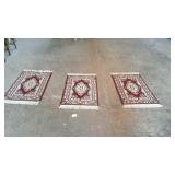 Group of three hallway runners with red and green